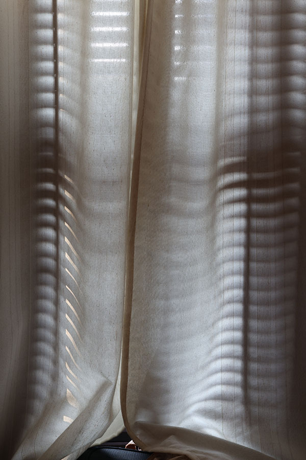 Photo of Curtains and Shadows .